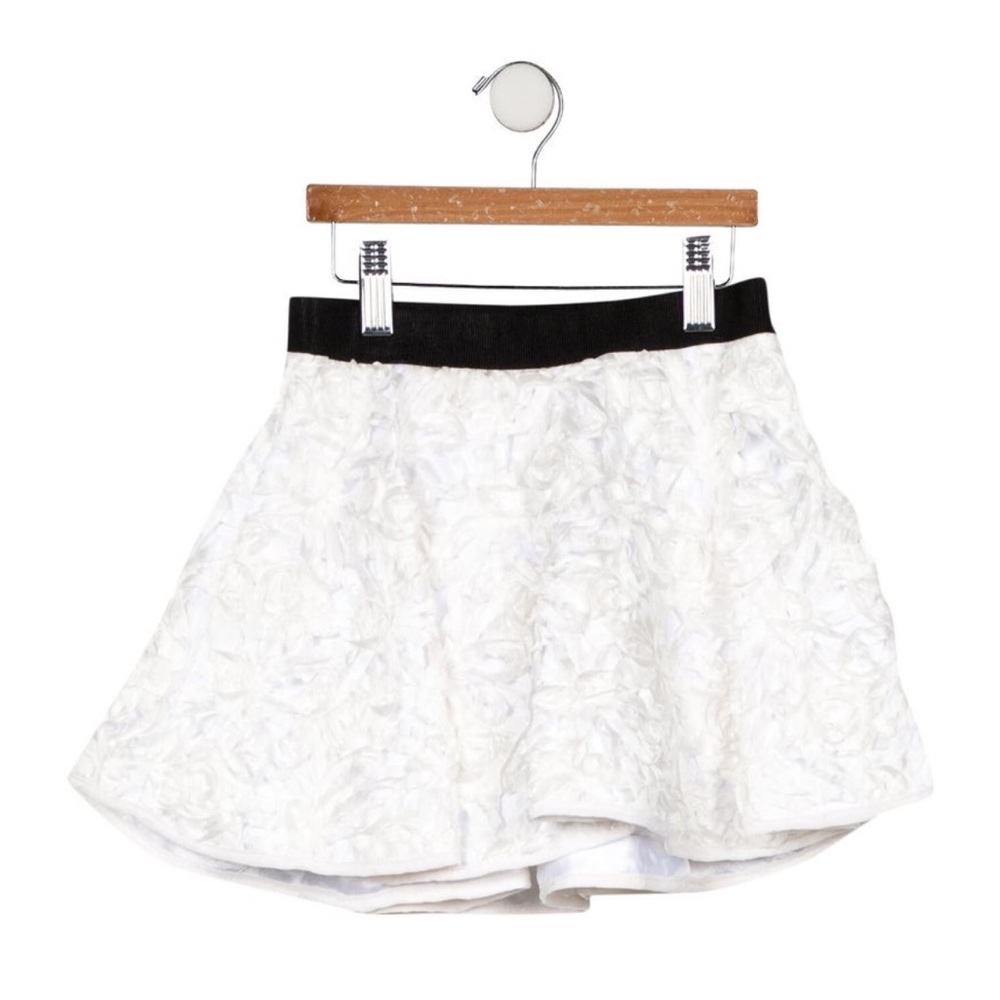 Girls' white silk Milly Minis skirt with zip closure at back.